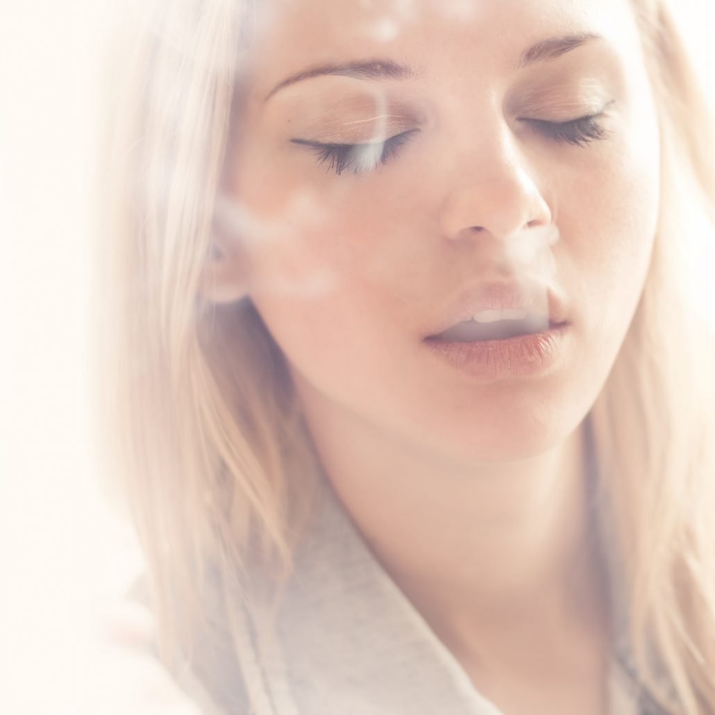 Young Woman Smoking   Shutterstock 100779463 1030x1030 